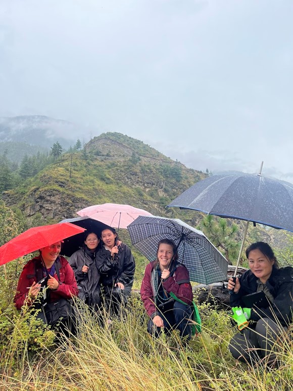 The DGM and ETH crew persevering through wet weather and drenched hillslopes.