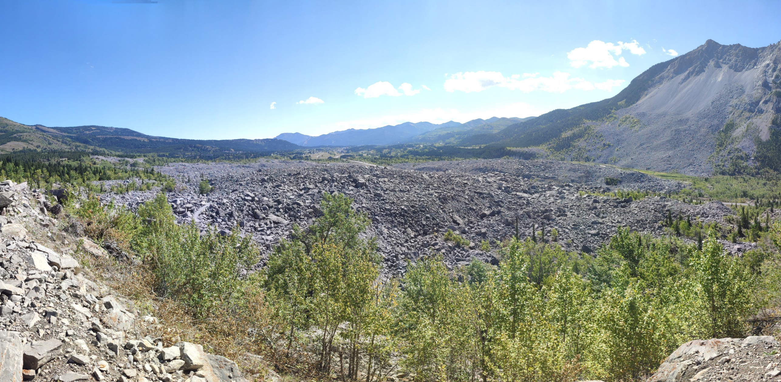 We design, install, and maintain a sensor network to provide a dataset that helps understanding landslide mechanisms. Image of the Frank Landslide.